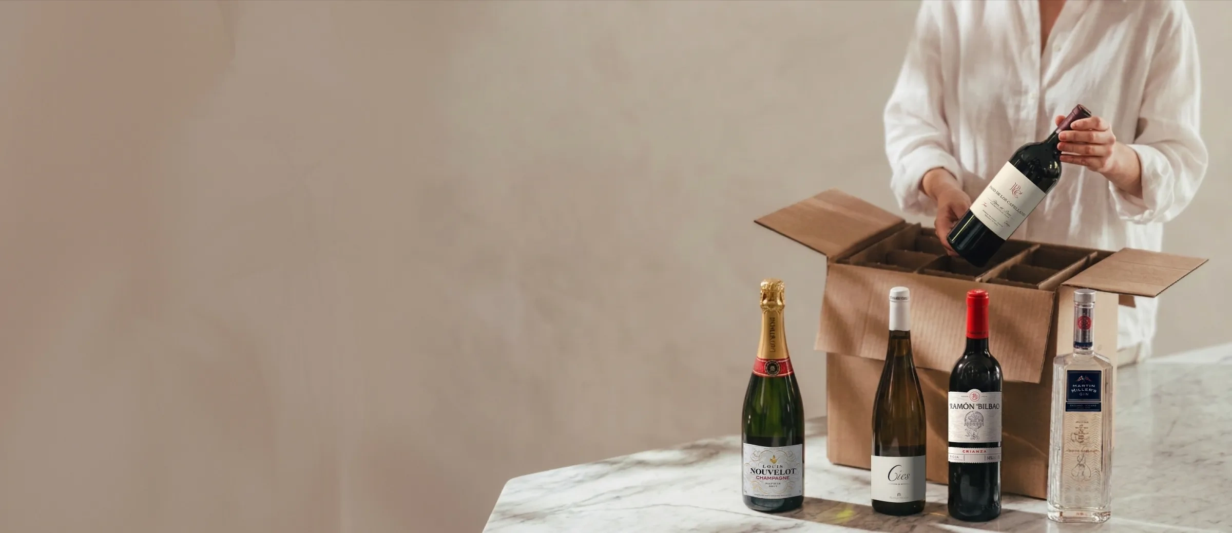 Caja con botellas de envío por promoción de portes gratis